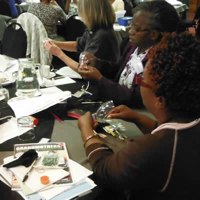 people making toys from waste